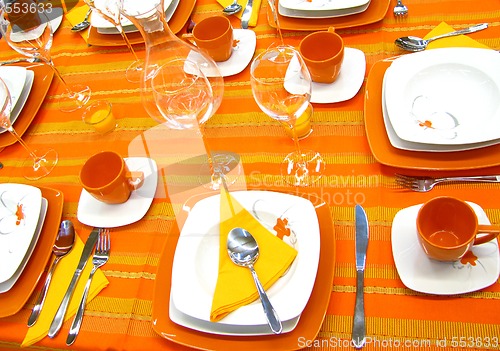 Image of Orange table setting