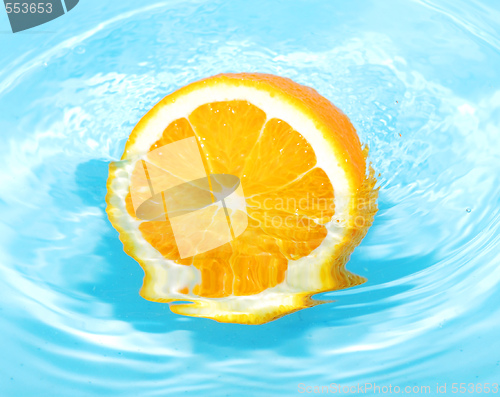Image of orange in splash