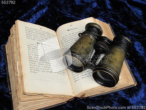 Image of Old binoculars and cookbook