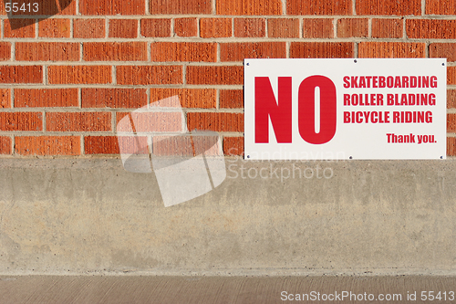 Image of no skateboarding rollerblading bicycle riding