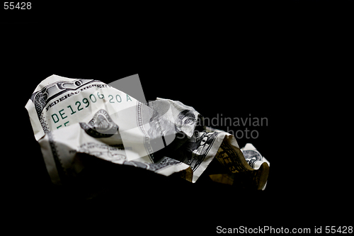 Image of crumpled hundred dollar bill