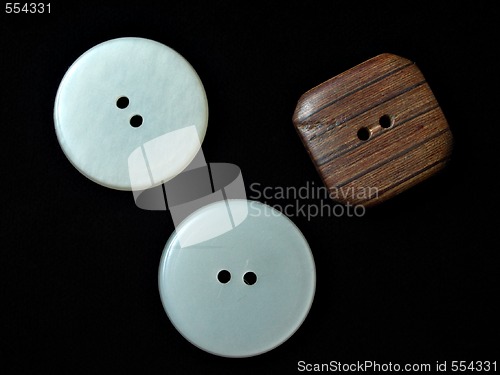 Image of white and brown buttons