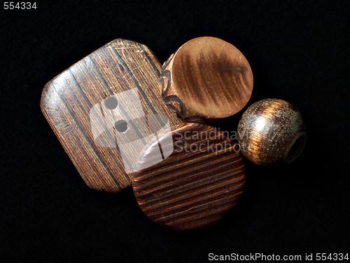 Image of wooden buttons stack