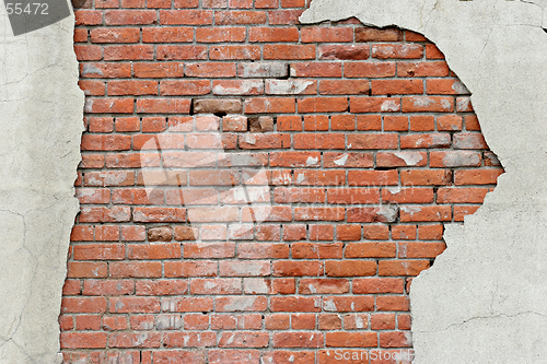 Image of torn brick wall background