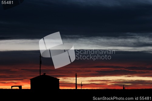 Image of house in setting sun