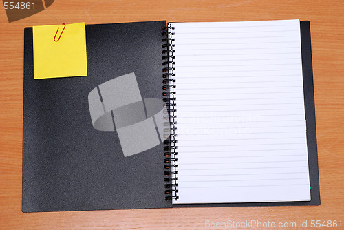 Image of open spiral  notebook