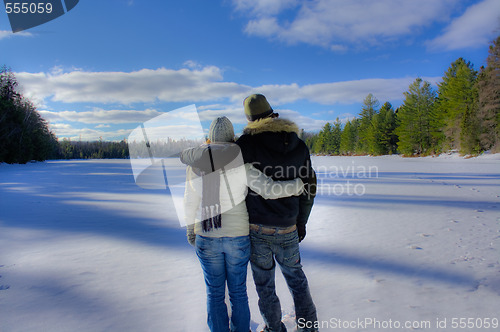 Image of a couple overlooking snow field in Algonquin Park.