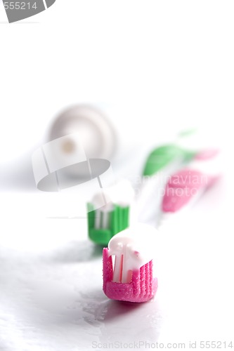 Image of toothpaste and toothbrushes