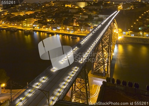 Image of big modern bridge at nighttime