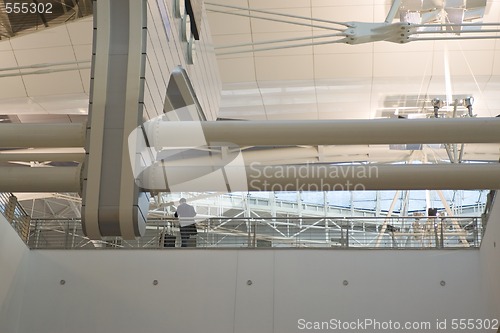 Image of businessman at modern airport