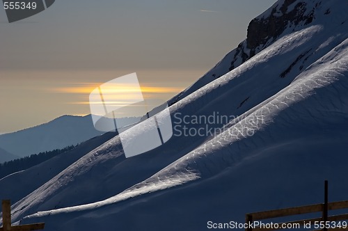 Image of sunset, mountains and sea