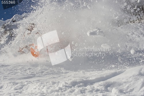Image of falling snowboarder