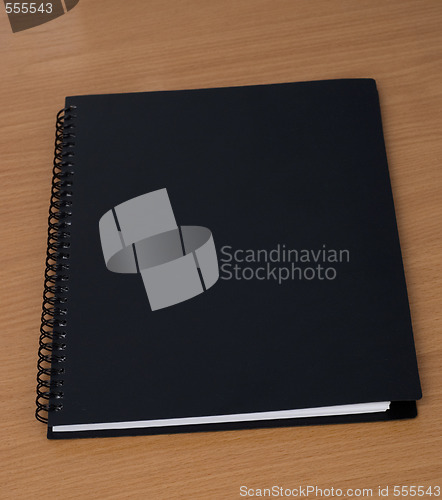 Image of spiral notebook on a table