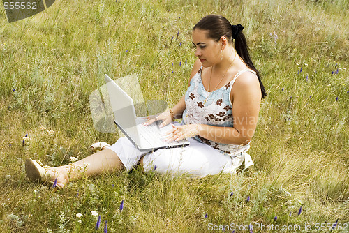 Image of woman with notebook