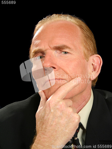 Image of Pondering Businessman