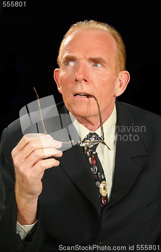 Image of Holding Glasses Businessman