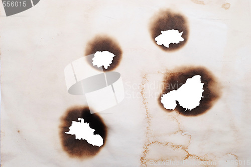 Image of burnt holes