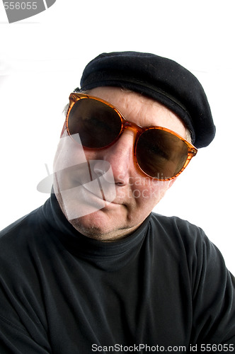 Image of man french beret suglasses