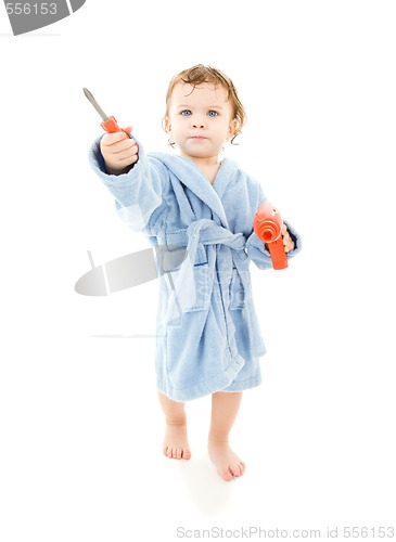 Image of baby boy with toy tools