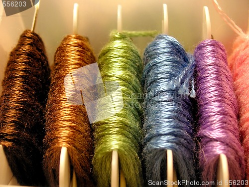 Image of silks on bobbins