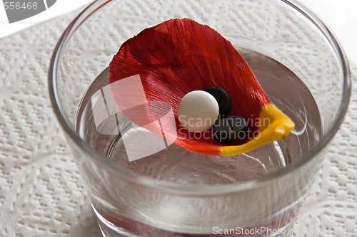 Image of three tablets on petal