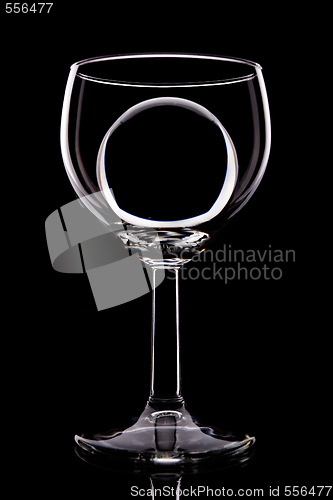 Image of wineglass and ball