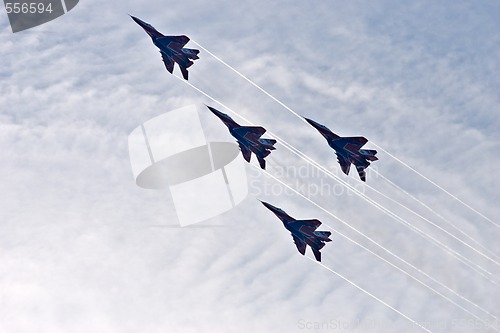 Image of four fighters in the sky