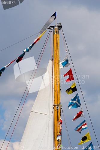 Image of sea ship mast with flags