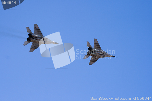 Image of Military jets flying through the sky