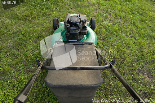 Image of Pushing a Lawn Mower