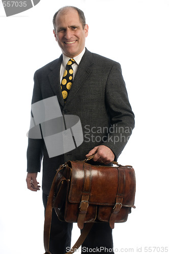 Image of happy smiling business executive with leather attache travel bag