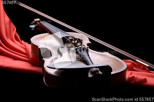 Image of violin with fiddlestick