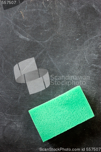Image of blackboard with cleaning sponge