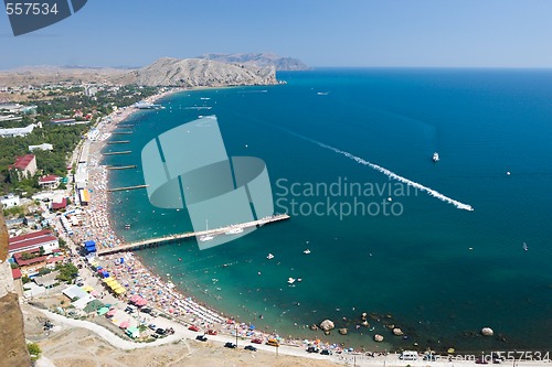 Image of aerial view of crowded beach