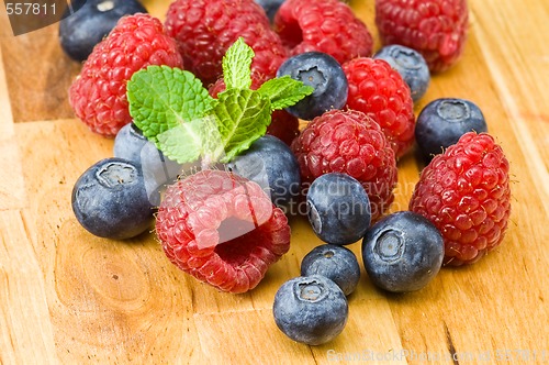 Image of Blueberry and rasperry with mint leaves