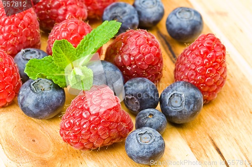 Image of Blueberry, ruspberry and mint leaves