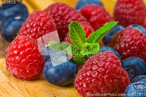 Image of Blueberry, ruspberry and mint leaves