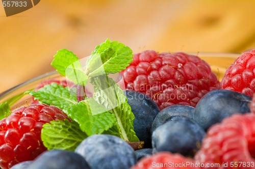 Image of Blueberry, ruspberry and mint leaves