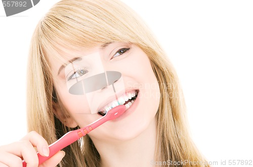 Image of happy girl with toothbrush