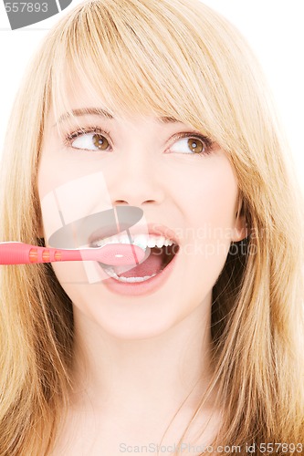 Image of happy girl with toothbrush