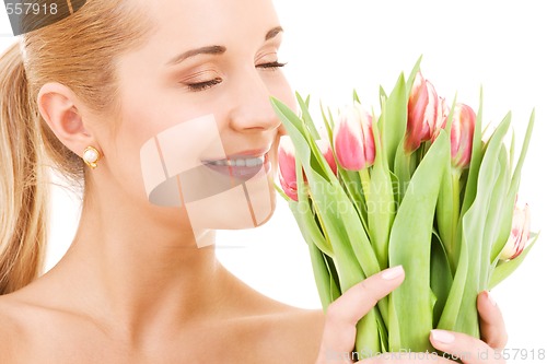 Image of happy woman with flowers