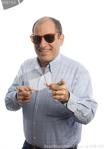 Image of smiling man with fingers pointing to viewer  