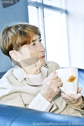 Image of Sad elderly woman