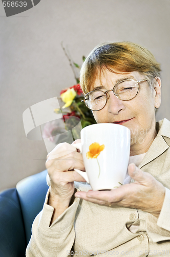 Image of Elderly woman relaxing