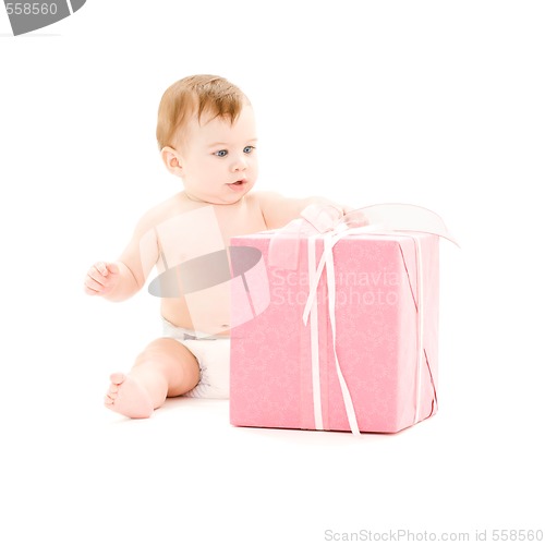 Image of baby boy with big gift box