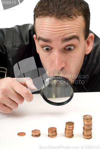 Image of Man Looking At Money