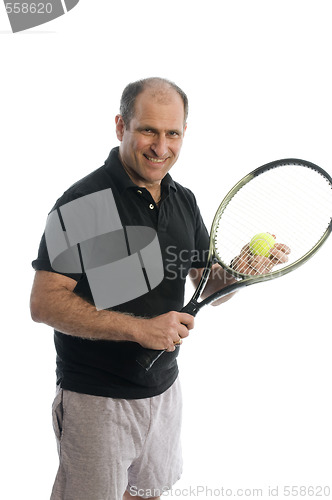 Image of active senior man playing tennis with beer belly