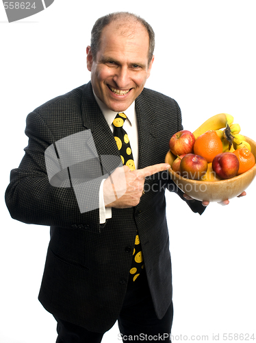 Image of happy healthy man with bowl of fruit