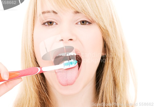 Image of happy girl with toothbrush