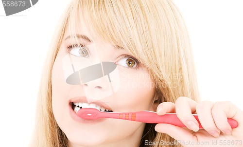 Image of happy girl with toothbrush